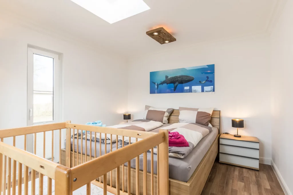 Ferienhaus Saphir Damshagen – Schlafzimmer mit Doppelbett